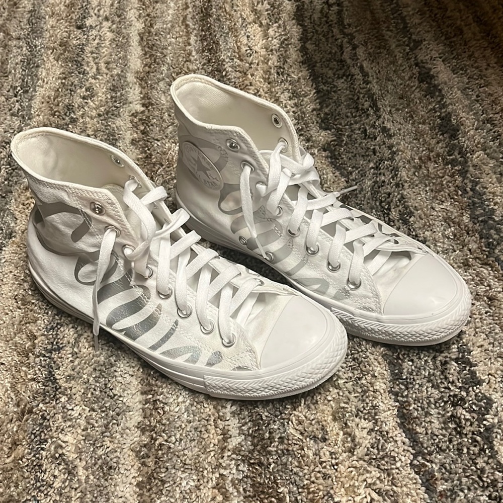 White and Silver Spelled Out High Top Converse